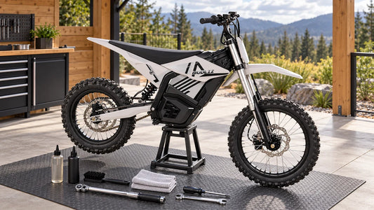 MUDLIZ electric dirt bike prepared for routine chain maintenance
